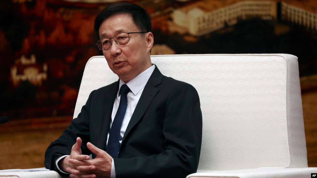 FILE - Chinese Vice President Han Zheng meets with British Foreign Secretary James Cleverly, not in photo, during a meeting at the Great Hall of the People in Beijing, Aug. 30, 2023. 