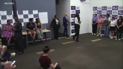 US voters mixed on Biden staying in race 