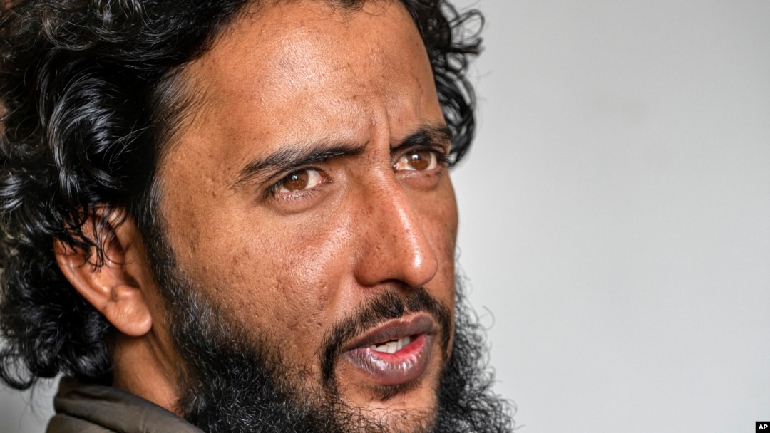 Fahad Shah, founder and editor of news portal The Kashmir Walla, speaks with the Associated Press at his residence on the outskirts of Srinagar, Indian controlled Kashmir, Nov. 24, 2023.