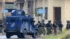 FILE - Pakistani soldiers cordon off a residential building during a raid on a militant hideout in Peshawar, April 16, 2019. Regional authorities announced on Tuesday that four Islamic State-affiliated operatives, reportedly Afghan nationals, were arrested in the city.