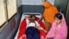 A victim of Friday's deadly bombing is treated in Quetta, Pakistan, Sept. 30, 2023. A suspected suicide bomber blew himself up among a crowd celebrating the Prophet Muhammad's birthday in Pakistan on Friday, killing more than 50 people, authorities said.