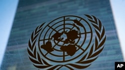 FILE - The symbol of the United Nations is displayed outside the Secretariat Building at U.N. headquarters in New York, Feb. 28, 2022.