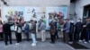 Taiwanese people line up to vote outside a polling station in Taipei, Jan. 13, 2024. Taiwanese are voting Saturday for a new president in an election that could chart the trajectory of its relations with China over the next four years.