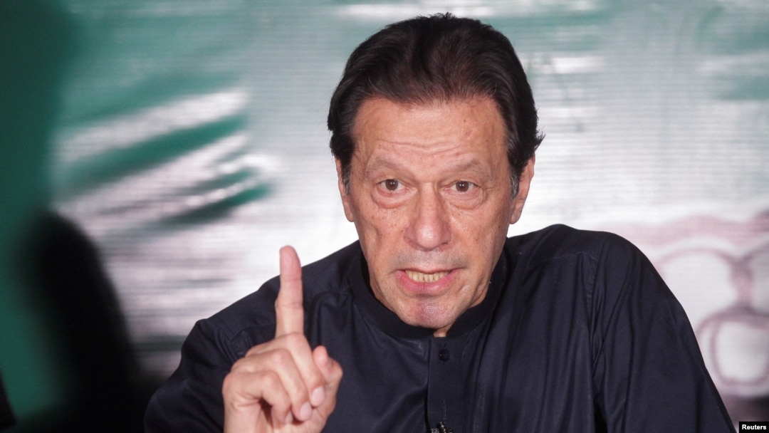 FILE - Pakistan's former Prime Minister Imran Khan, gestures as he speaks to the members of the media at his residence in Lahore, Pakistan, May 18, 2023.