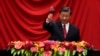Chinese President Xi Jinping makes a toast after delivering his speech at a dinner marking the 74th anniversary of the founding of the People's Republic of China at the Great Hall of the People in Beijing, Sept. 28, 2023. 