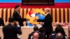 Chinese President Xi Jinping, left, and Russian President Vladimir Putin shake hands during the Belt and Road Forum at the Great Hall of the People in Beijing, Oct. 18, 2023. 