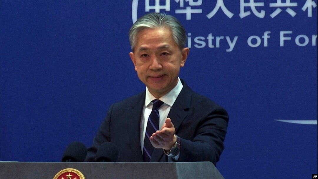 FILE - In this image from video, Chinese Foreign Ministry spokesperson Wang Wenbin speaks during a media briefing at the ministry in Beijing, Feb. 13, 2023.