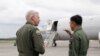 Commander U.S. 7th Fleet, Vice Admiral Karl Thomas, left, speaks with Naval Air Wing Commander of the Philippine Navy Commodore Juario Marayag Aug. 26 in Manila, Philippines.