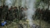 Basoda ba mampinga ma RDC (FARDC) na nzamba mpo na kobundisa eleongo batomboki ba ADF na parc ya national ya Virunga, Nord-Kivut, 14 décembre 2021.