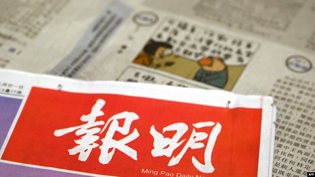 A photo illustration shows the front page of the Ming Pao News and a cartoon by cartoonist Wong Kei-kwan, who uses the nom de plume "Zunzi", on May 10, 2023. The political cartoonist will have his newspaper columns suspended from May 14.