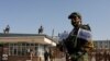 FILE - Taliban soldiers stand guard at the second-anniversary ceremony of the takeover of Kabul by the Taliban in Kabul, Afghanistan, August 15, 2023.