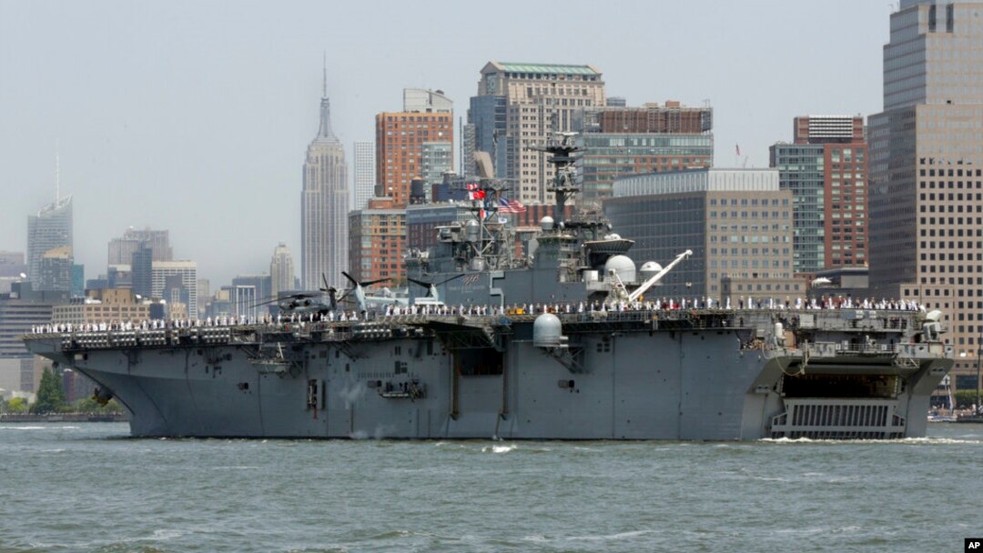 FILE - The USS Bataan,.from Norfolk, Va., sails up the Hudson River in New York, May 25, 2016. The three-ship Bataan amphibious readiness group is being sent to the Persian Gulf in the wake of Iranian attempts to seize commercial ships there. 