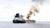 FILE - The tanker Marlin Luanda is seen on fire in the Gulf of Aden after being hit by a missile launched by Yemen’s Houthi rebels, Jan. 27, 2024. A Houthi missile hit the bulk carrier True Confidence in the gulf March 6, killing two. (Indian navy/AP)