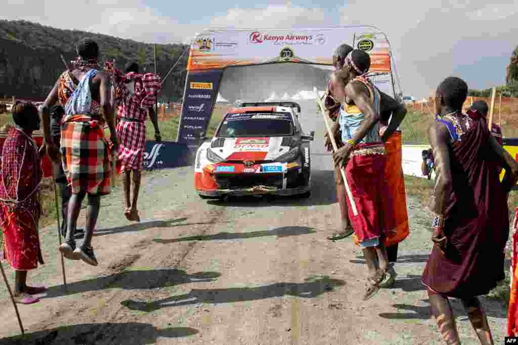 French rally team of driver Sebastian Ogier and his co-driver Vincent Landais arrive to pomp at the finish line to win the WRC Safari Rally Kenya, part of the FIA World Rally Championship in their Toyota Gr Yaris Rally1 Hybrid at the lake-side town of Naivasha, June 25, 2023.&nbsp;