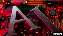 路透社资料照：插图显示 AI（人工智能）字母和计算机主板