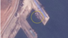 라진항을 촬영한 9일 자 위성사진. 중국 전용 부두에 선박(원 안)이 정박해 있다. 사진=Planet Labs