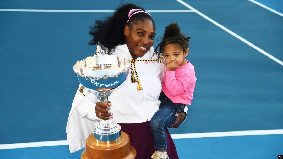 FILE - Serena Williams holds her daughter Alexis Olympia Ohanian Jr., and the ASB trophy after winning the ASB Classic in Auckland, New Zealand, Sunday, Jan 12, 2020. (Chris Symes/Photosport via AP, File)