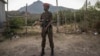 FILE - A soldier from the Ethiopian National Defense Force patrols in Kombolcha, Ethiopia, Dec. 10, 2021.
