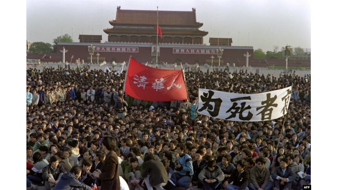 Chinese students pay homage to former Chinese Communist Party leader and liberal reformer Hu Yaobang in Tiananmen Square on April 22, 1989 at Beijing. His death triggered an unprecedented wave of pro-democracy demonstrations culminating in the massacre of demonstrators by the People's Liberation Army in Tiananmen Square on the night of June 3-4, 1989.