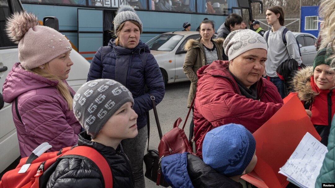 Evacuees from the Mariupol region arrive at reception center, as Russia's invasion of Ukraine continues, in Zaporizhzhia, Ukraine, March 31, 2022.