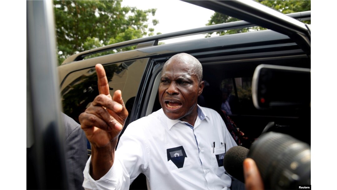 FILE - Martin Fayulu, runner-up in Democratic Republic of Congo's presidential election enters his car after delivering his appeal contesting the Congo's National Independent Electoral Commission results at the constitutional court in Kinshasa, Democratic