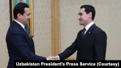 Turkmaniston Prezidenti Sardor Berdimuhammedov (o'ngda) O'zbekiston Prezidenti Administratsiyasi rahbari Sardor Umurzoqov bilan, 2022-yil, 12-dekabr.