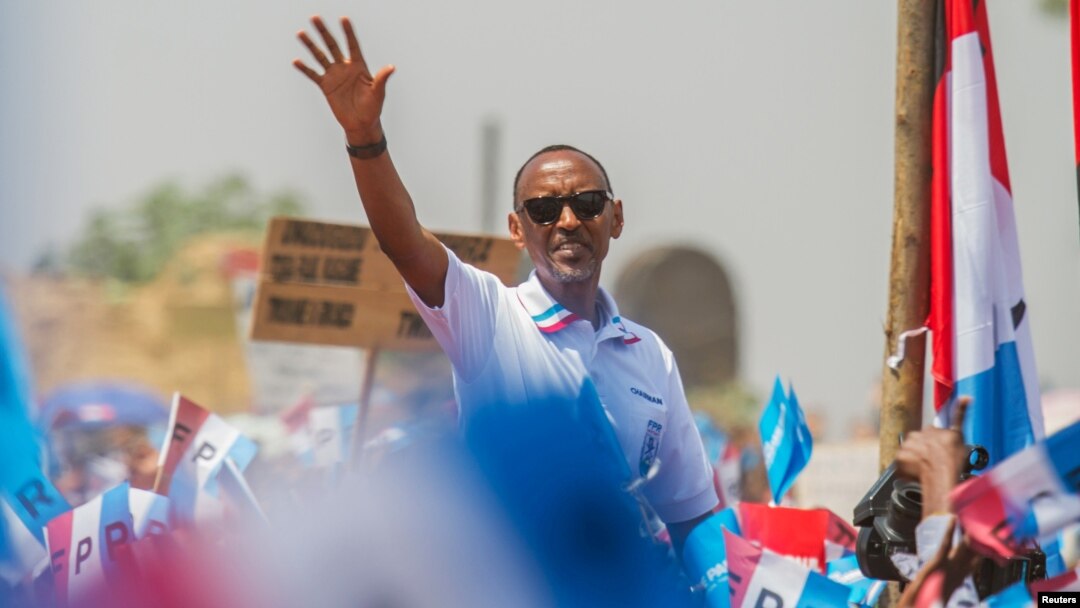Rwandan President Paul Kagame of the ruling Rwandan Patriotic Front (RPF) waves to his supporters during his final campaign rally in Kigali, Rwanda, Aug. 2, 2017.