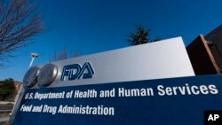 FILE - A sign for the Food and Drug Administration is seen in Silver Spring, Md., Dec. 10, 2020.
