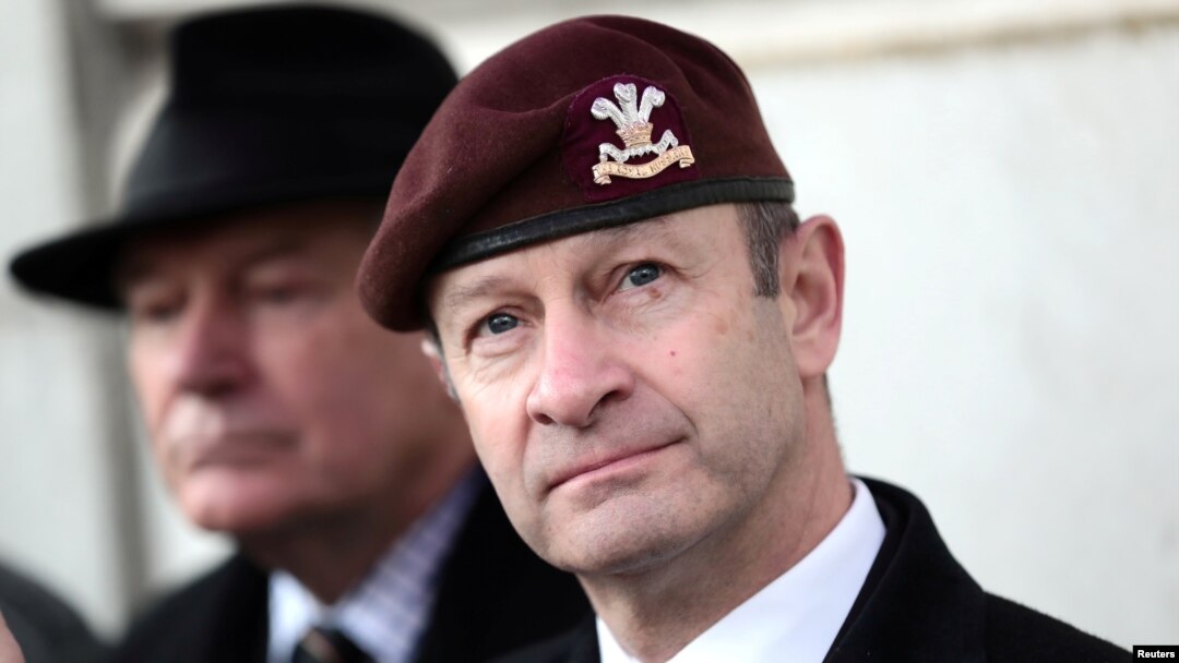 FILE - Then-UKIP leader Henry Bolton joins protesters from "Justice for Northern Ireland Veterans" as they demonstrate in Horse Guards Parade in Westminster in London, Feb. 3, 2018. 