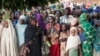 FILE - Refugees from Central Africa wait in Cameroonian Garoua Boulaï border town for foods and clothes delivering by humanitarian associations, April 25, 2014. 