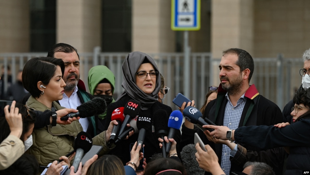 Hatice Cengiz, the fiancee of slain Saudi critic Jamal Khashoggi, answers journalists' questions outside the courthouse in Istanbul, April 7, 2022. 