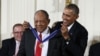President Barack Obama presents the Presidential Medal of Freedom to Willie Mays during a ceremony Nov. 24, 2015, in the East Room of the White House. 