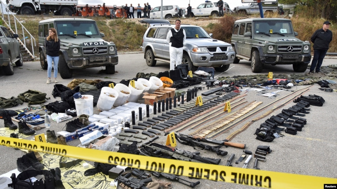 Kosovo police display weapons and military equipment seized during a police operation in the village of Banjska, at a police camp near Mitrovica, Kosovo, September 25, 2023.
