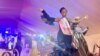 Kabasambo Esther, winner of the Miss Y+ Beauty Pageant 2019-2020, in Kampala, Uganda, waves to the audience, Nov. 22, 2019. (Halima Athumani/VOA)