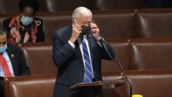 FILE - In this image from video, Rep. Steny Hoyer, D-Md., takes his face covering off as he speaks on the floor of the House of Representatives at the U.S. Capitol in Washington, April 23, 2020. (House Television via AP)