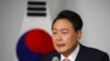 South Korea's president-elect Yoon Suk Yeol speaks during a news conference at the National Assembly in Seoul, South Korea, March 10, 2022.