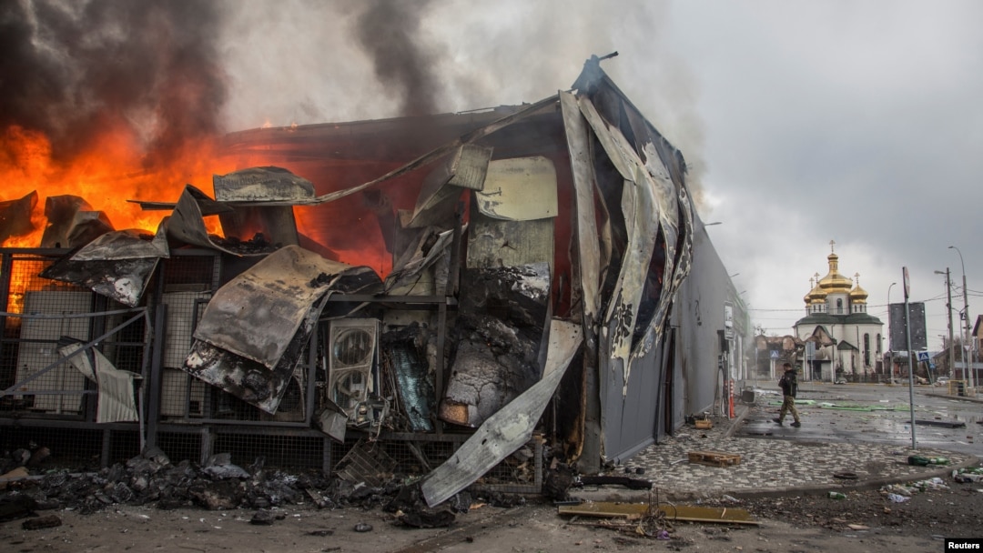 Fire burns in a building after a shelling, as Russia's attack on Ukraine continues, in the town of Irpin, Kyiv region, Ukraine March 30, 2022.