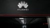 FILE - A technician stands at the entrance to a Huawei 5G data server center in Guangzhou, in southern China's Guangdong province on Sept. 26, 2021. 