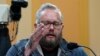 Jason Van Tatenhove, an ally of Oath Keepers leader Stewart Rhodes, testifies as the House select committee investigating the January 6 attack on the U.S. Capitol holds a hearing at the Capitol in Washington, July 12, 2022. 