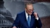US Senate Majority Leader Chuck Schumer (D-NY) speaks to the media after the 51-50 vote passed the 'Inflation Reduction Act of 2022' on Capitol Hill in Washington, Aug. 7, 2022. 