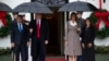 President Donald Trump and first lady Melania Trump pose for photos with Guatemalan President Jimmy Morales and his wife Patricia Marroquin de Morales at the White House, Tuesday, Dec. 17, 2019, in Washington.