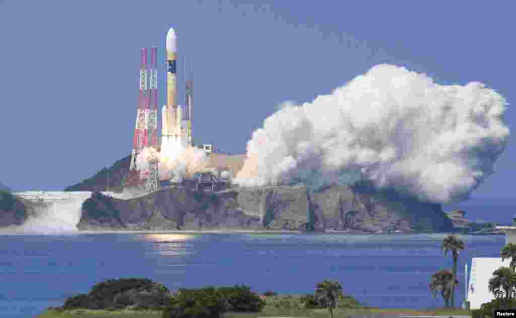 A H-IIA rocket carrying Michibiki 3 satellite, one of four satellites that will augment regional navigational systems, lifts off from the launching pad at Tanegashima Space Center on the southwestern island of Tanegashima, Japan, in this photo taken by Kyodo, Aug. 19, 2017.