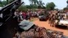 Armed fighters from the Seleka rebel alliance patrol the streets in pickup trucks to stop looting in Bangui, March 2013.