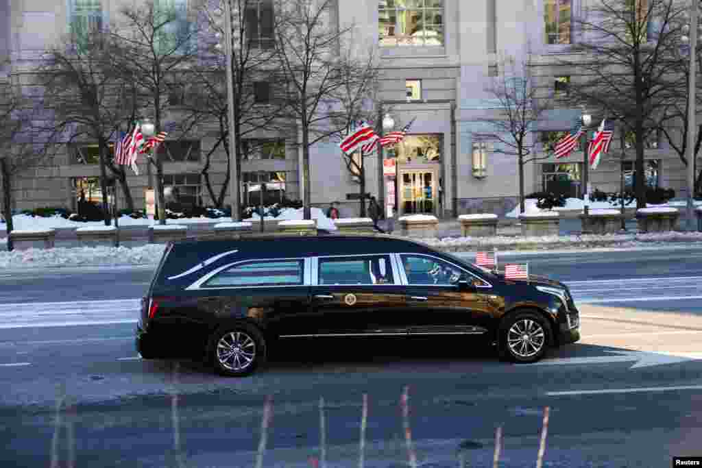 The coffin with the body of former U.S. President Jimmy Carter in a car moves on its way from the U.S. Capitol to Washington National Cathedral in Washington, Jan. 9, 2025. 