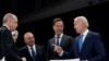 US President Joe Biden (R) speaks with Netherland's Prime Minister Mark Rutte (2nd R), Turkish President Recep Tayyip Erdogan (L) and
Foreign minister Mevlut Çavusoglu (3rd L) at the NATO summit in Madrid, June 29, 2022.