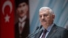 Turkey's Prime Minister Binali Yildirim speak to the country's security chiefs in Ankara, Jan. 18, 2018. 