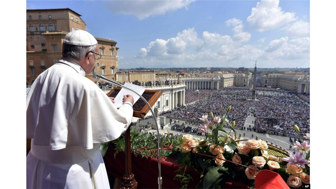 Pope Francis delivers his Urbi et Orbi (to the city and to the world) message from the main balcony of St. Peter's Basilica, at the Vatican, April 16, 2017.