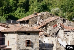 Arquata del Tronto - residents in the medieval towns of the quake zone hope one day to attract back tourists; now though they get upset with disaster tourists taking selfies of themselves amid the ruins, which they see as being disrespectful. (J. Dettmer/VOA)
