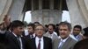 Indian Foreign Minister S.M. Krishna (C) is briefed by Pakistani officials during his visit to the Minar-e-Pakistan in Lahore, Pakistan, September 9, 2012.