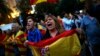 Anti-independence demonstrators waving Spanish flags shout slogans during a protest in Barcelona, Oct. 4, 2017.